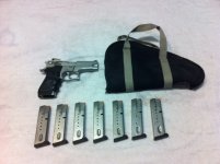 S_W 9mm with case and 7 15 shot mags.jpg